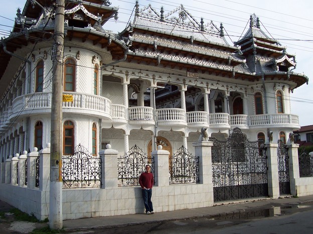 Brandon in front of a gypsy house